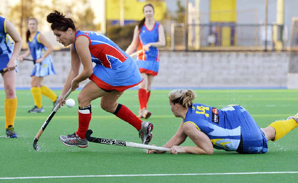 DESPERATE DEFENCE: Swifts speedster Kirsty Bennett leaves Hancocks defender Caitlin Sippel stranded during last year’s A-grade grand final. DESPERATE DEFENCE: Swifts speedster Kirsty Bennett leaves Hancocks defender Caitlin Sippel stranded during last year’s A-grade grand final.