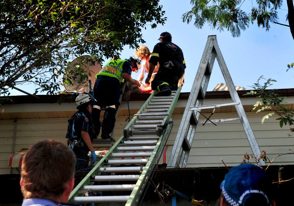 DELICATE RESCUE: More than 20 emergency services personnel were called to a house to rescue a 52-year-old man who had fallen through a roof. DELICATE RESCUE: More than 20 emergency services personnel were called to a house to rescue a 52-year-old man who had fallen through a roof.