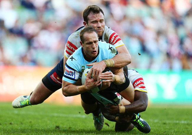 Jeff Robson of the Sharks is tackled during the NRL Elimination Final match between the Cronulla Sharks and the North Queensland Cowboys. Jeff Robson of the Sharks is tackled during the NRL Elimination Final match between the Cronulla Sharks and the North Queensland Cowboys.