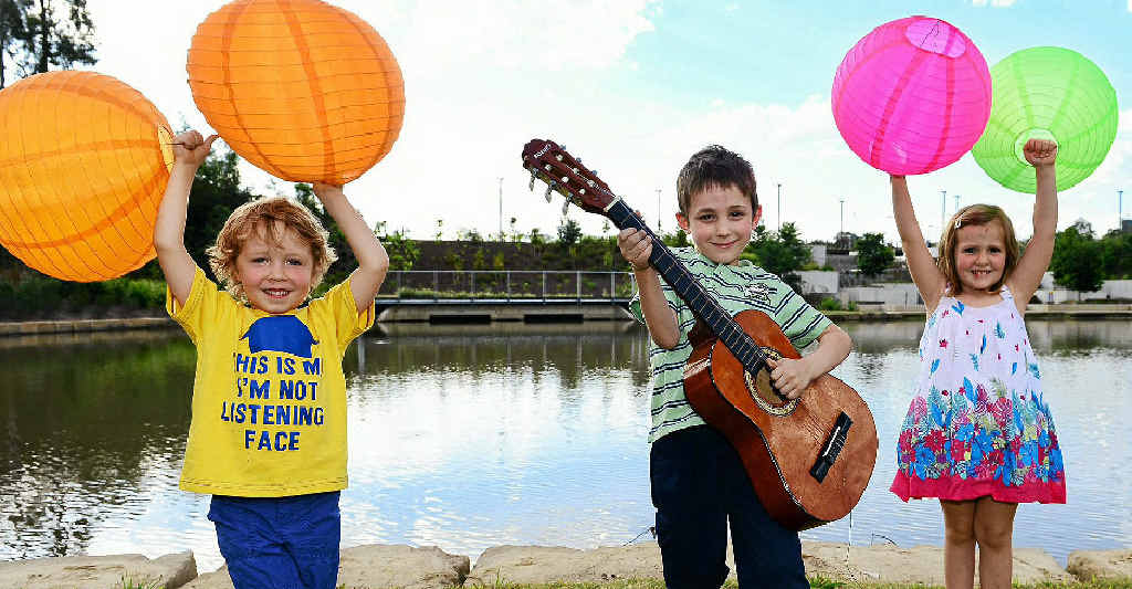 BAND FEVER: Excited about the lantern festival and Battle of the Bands (from left) are Stanley Roslin-Clark, 4, Noah Barnes, 6, and Zoe Gibson, 4. BAND FEVER: Excited about the lantern festival and Battle of the Bands (from left) are Stanley Roslin-Clark, 4, Noah Barnes, 6, and Zoe Gibson, 4.