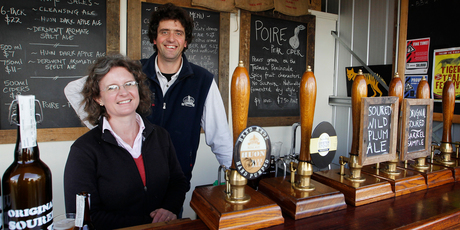 The Two-Metre-Tall man Ashley Huntington with his wife Jane. The Two-Metre-Tall man Ashley Huntington with his wife Jane.