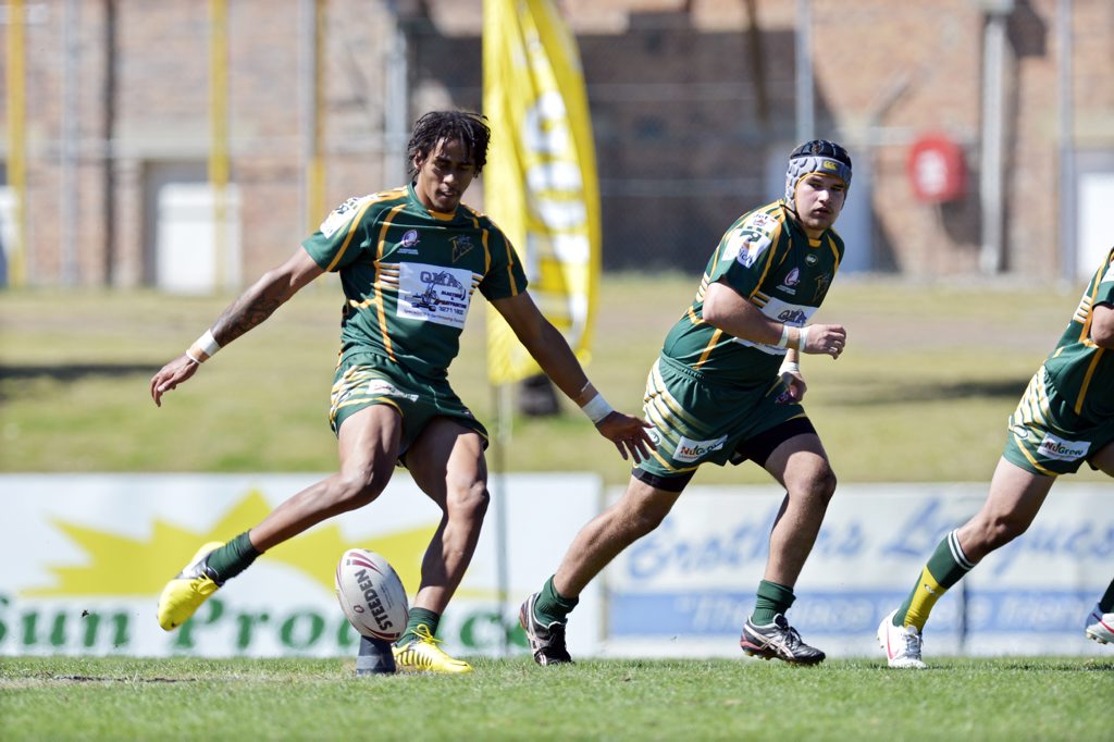NATURAL: Ipswich Jets FOGS player Khan Ahwang (kicking) has taken out the competition’s top player award for the second straight year. NATURAL: Ipswich Jets FOGS player Khan Ahwang (kicking) has taken out the competition’s top player award for the second straight year.