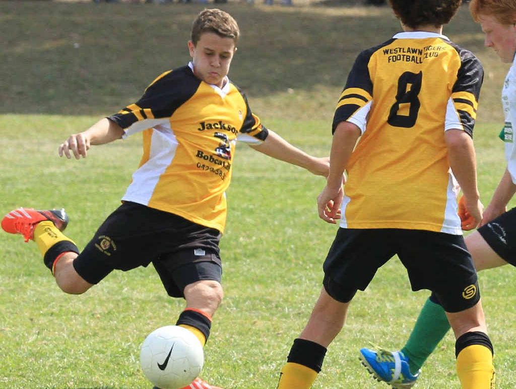 KICKING IN: Thomas Baker goes for the kick. KICKING IN: Thomas Baker goes for the kick.
