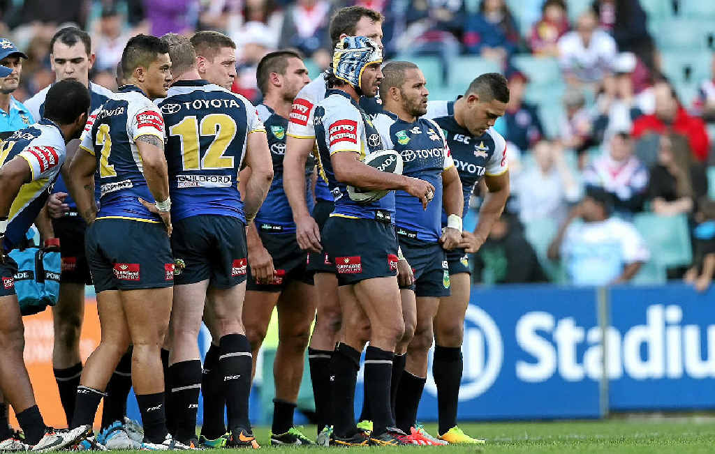 DOWN FOR THE COUNT: Dejected Cowboys players in the elemination final against the Cronulla Sharks. DOWN FOR THE COUNT: Dejected Cowboys players in the elemination final against the Cronulla Sharks.