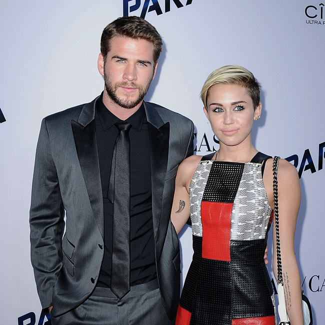 Liam Hemsworth and Miley Cyrus Liam Hemsworth and Miley Cyrus