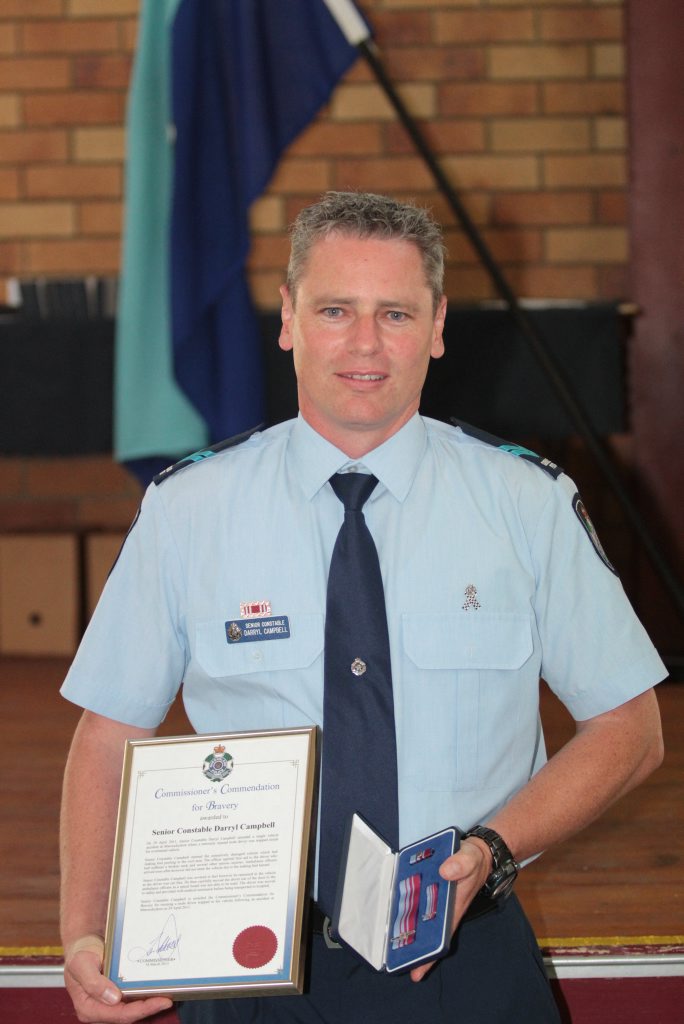 Senior Constable Darryl Campbell after receiving a bravery award for risking his life to pull a motorist from a vehicle. Photo Darryn Smith / Sunshine Coast Daily Senior Constable Darryl Campbell after receiving a bravery award for risking his life to pull a motorist from a vehicle. Photo Darryn Smith / Sunshine Coast Daily