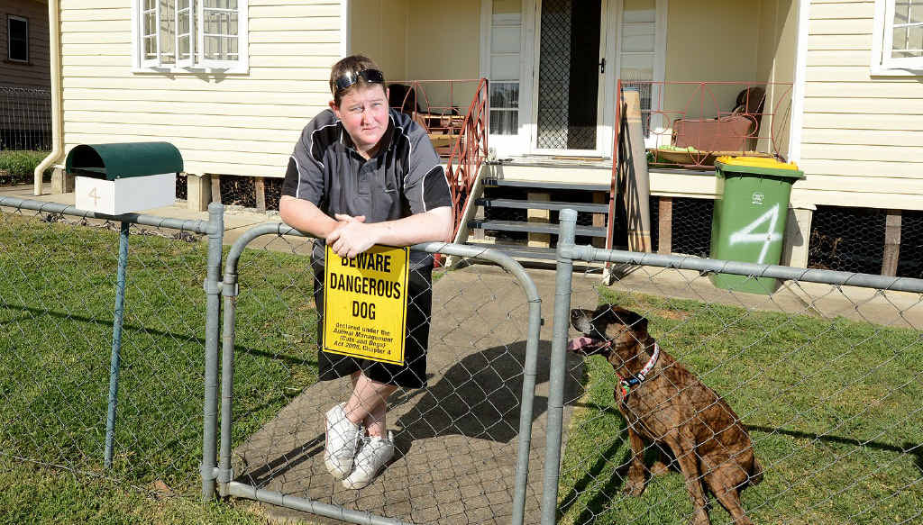 DANGEROUS DOG: Council is telling dog owner Catherine Maylor to raise her fence to 6ft or her dog, Kyra, will be taken away and put down. DANGEROUS DOG: Council is telling dog owner Catherine Maylor to raise her fence to 6ft or her dog, Kyra, will be taken away and put down.