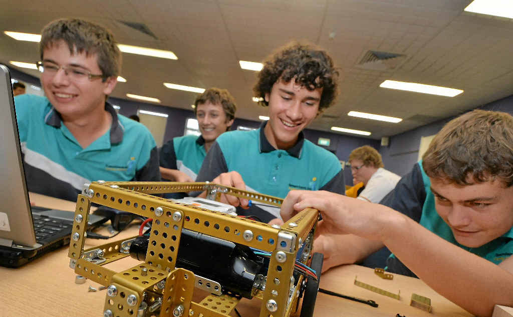 Liam Lord, Mackenzie Plath, Robert Morris and Jimmy Staats attend a workshop for the FIRST Robotics Competition. Liam Lord, Mackenzie Plath, Robert Morris and Jimmy Staats attend a workshop for the FIRST Robotics Competition.