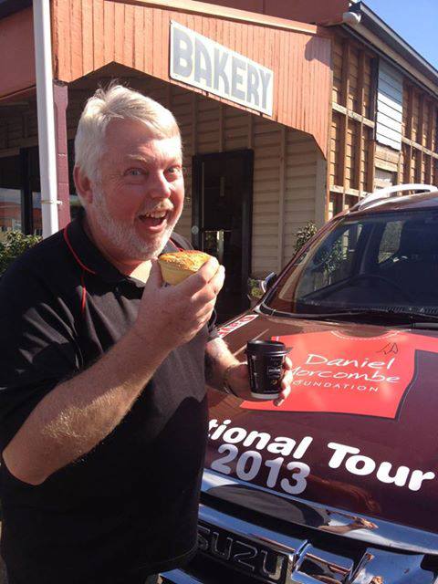 Bruce Morcombe tucks into a crocodile pie at Blackbutt Bakery. Bruce Morcombe tucks into a crocodile pie at Blackbutt Bakery.