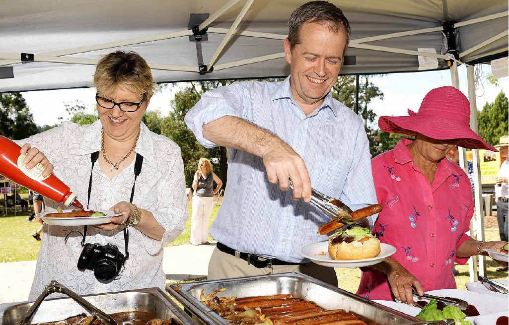 TUCKING IN: Bill Shorten gets into some lunch at Lobley Park in Churchill on Sunday afternoon. TUCKING IN: Bill Shorten gets into some lunch at Lobley Park in Churchill on Sunday afternoon.