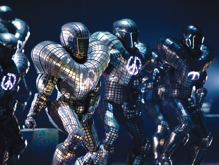 Dancers perform to the song Soldier in a scene from Cirque Du Soleil's Michael Jackson The Immortal World Tour.
