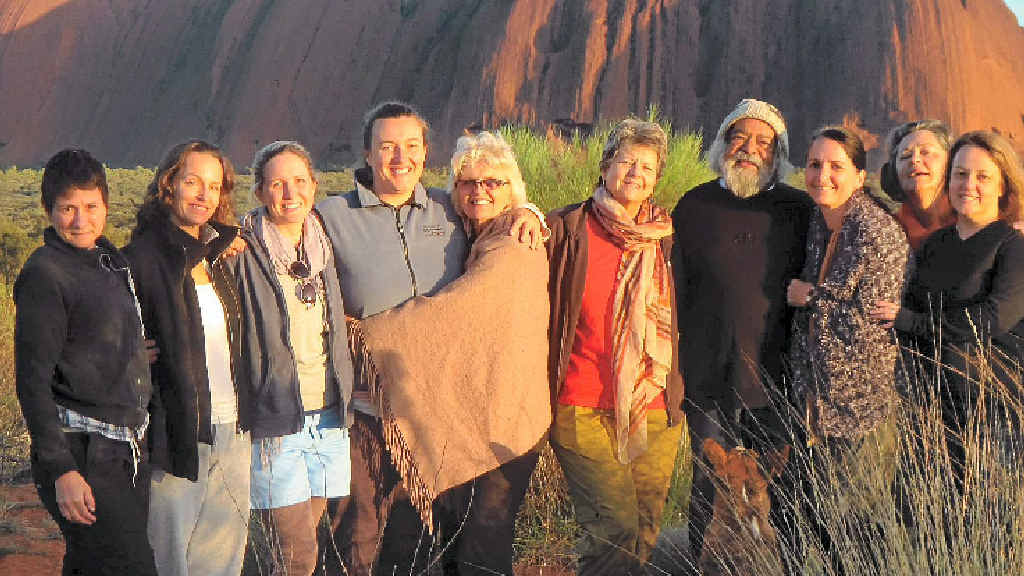IMAGE-FREE ZONE: New Brighton Beach author Denise Greenaway (centre, with shawl) and women attending her desert retreats. Also pictured is Uluru elder Bob Randall. IMAGE-FREE ZONE: New Brighton Beach author Denise Greenaway (centre, with shawl) and women attending her desert retreats. Also pictured is Uluru elder Bob Randall.