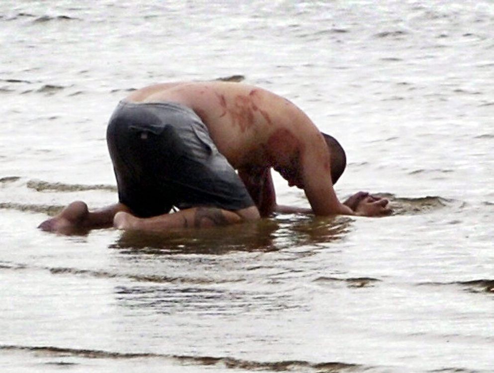 Hervey Bay man Eric Heuer on Urangan beach after attacking his flatmates. Hervey Bay man Eric Heuer on Urangan beach after attacking his flatmates.