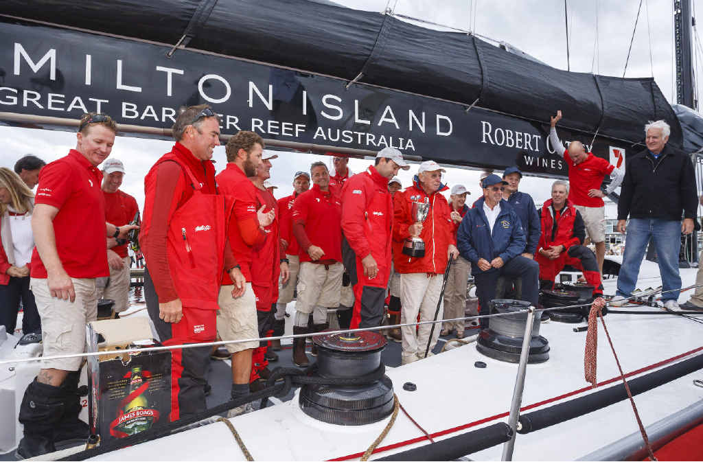 Wild Oats crew pose with their trophy after winning the line honours in the Rolex Sydney to Hobart Yacht Race at Constitution Dock in Hobart last December. Wild Oats crew pose with their trophy after winning the line honours in the Rolex Sydney to Hobart Yacht Race at Constitution Dock in Hobart last December.