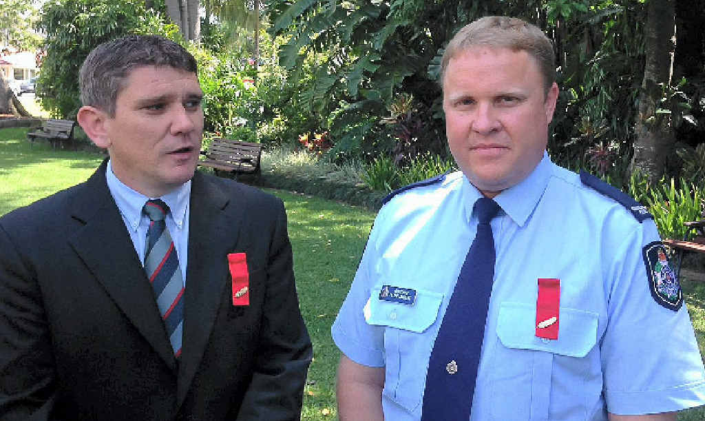 JOB WELL DONE: Helicopter pilots John (left) and Simon McDermott were awarded a group bravery citation for their work during the floods. JOB WELL DONE: Helicopter pilots John (left) and Simon McDermott were awarded a group bravery citation for their work during the floods.