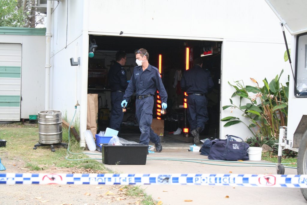 Police investigating a clandestine drug laboratory in High Street Photo last week. Rachael Conaghan / Morning Bulletin Police investigating a clandestine drug laboratory in High Street Photo last week. Rachael Conaghan / Morning Bulletin