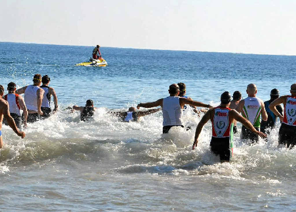 Competitors enjoy the surf swim leg at a previous Agnes Water Triathlon. Competitors enjoy the surf swim leg at a previous Agnes Water Triathlon.