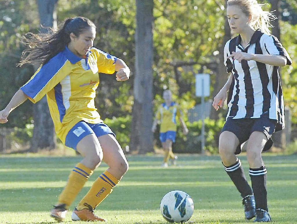 TENSE: Mullumbimby’s Savanah Kennedy (left) and Byron Bay’s Maddison Green challenge for possession during a grade 16 clash at this year’s Oceania Cup. TENSE: Mullumbimby’s Savanah Kennedy (left) and Byron Bay’s Maddison Green challenge for possession during a grade 16 clash at this year’s Oceania Cup.