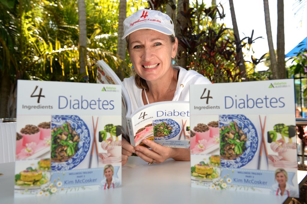 Kim McCosker in the Tweed with her new book. Kim McCosker in the Tweed with her new book.