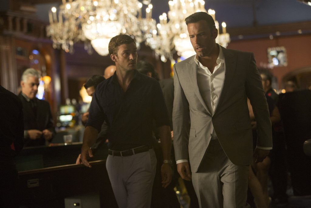 Justin Timberlake and Ben Affleck in a scene from the movie Runner Runner. Justin Timberlake and Ben Affleck in a scene from the movie Runner Runner.