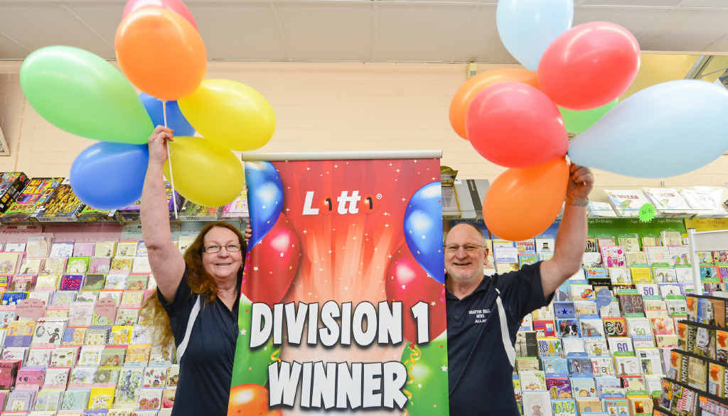 UP IN THE AIR: Joan and Allan Worland of Grafton Mall News put up the ballooons after selling a $1m winning Lotto ticket. UP IN THE AIR: Joan and Allan Worland of Grafton Mall News put up the ballooons after selling a $1m winning Lotto ticket.