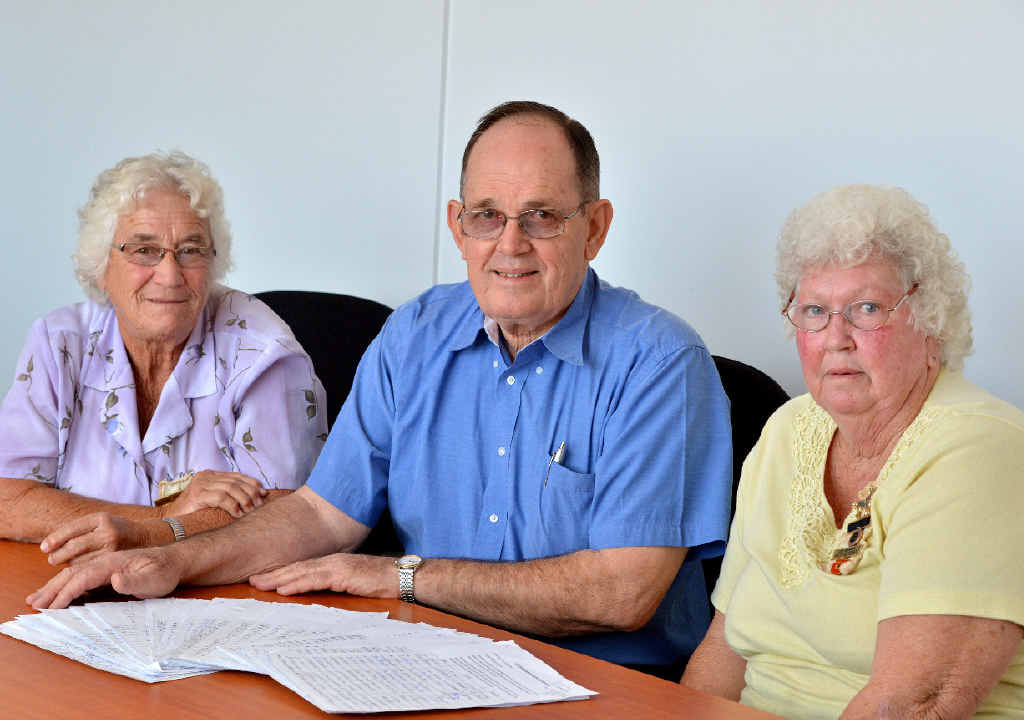 Cr Peterson (centre) accepts petitions against the levee from Kay Skyring and Maureen Perry. Cr Peterson (centre) accepts petitions against the levee from Kay Skyring and Maureen Perry.