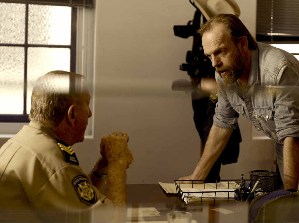 TENSE DRAMA: Tony Barry (left) and Hugo Weaving in a scene from Mystery Road filmed inside the former Ipswich police station. TENSE DRAMA: Tony Barry (left) and Hugo Weaving in a scene from Mystery Road filmed inside the former Ipswich police station.