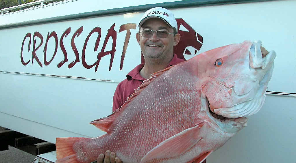 NICE ONE: Agnes Water recreational fisherman Mark Cross and a nice red emperor. NICE ONE: Agnes Water recreational fisherman Mark Cross and a nice red emperor.