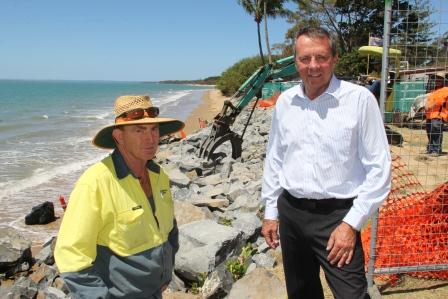 Cliff Clarke from Coastal Maintenance and Equipment Hire and councillor Trevor McDonald check on the progress of work to repair the Scarness beach rock wall. Cliff Clarke from Coastal Maintenance and Equipment Hire and councillor Trevor McDonald check on the progress of work to repair the Scarness beach rock wall.
