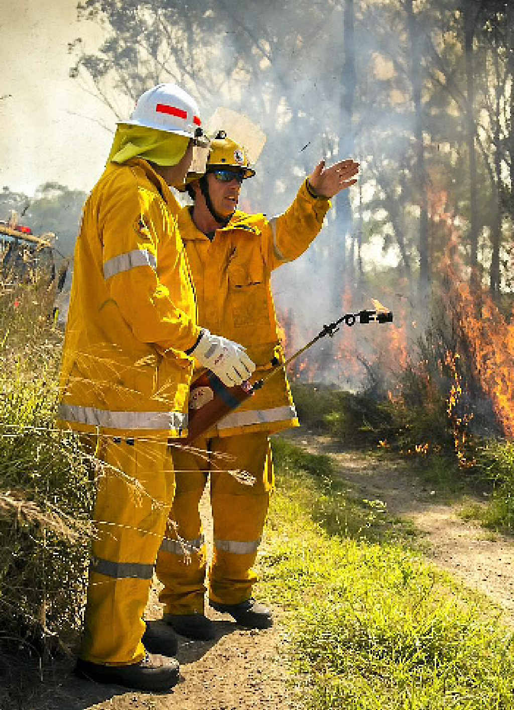 NO TO KEELTY: Rural firefighters performing precautionary back-burns on Gladstone-Benaraby Rd recently. NO TO KEELTY: Rural firefighters performing precautionary back-burns on Gladstone-Benaraby Rd recently.
