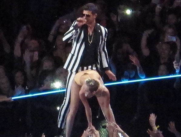 Robin Thicke and Miley Cyrus perform at the MTV Video Music Awards. Robin Thicke and Miley Cyrus perform at the MTV Video Music Awards.