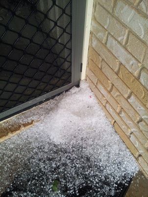 Heavy hail fell across parts of the region this afternoon. Oakey local Antoinette Nette Eather sent us this photo of her front door. Heavy hail fell across parts of the region this afternoon. Oakey local Antoinette Nette Eather sent us this photo of her front door.