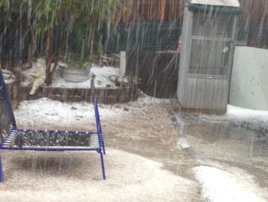 Steph Childes sent us this photo of hail falling at her place in Oakey. Steph Childes sent us this photo of hail falling at her place in Oakey.