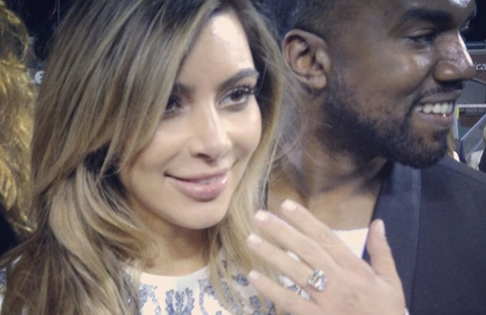 Kim Kardashian showing off engagement ring. Kim Kardashian showing off engagement ring.