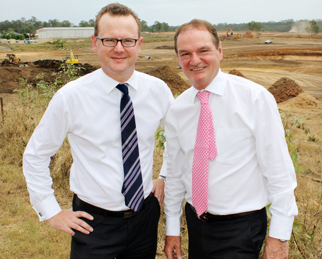 Daniel Brekan General Manager Queensland for Goodman Group and Ipswich Mayor Paul Pisasale stand on Montgomery Street, Redbank with earthworks underway for the new Redbank Motorway Estate in the background. Daniel Brekan General Manager Queensland for Goodman Group and Ipswich Mayor Paul Pisasale stand on Montgomery Street, Redbank with earthworks underway for the new Redbank Motorway Estate in the background.