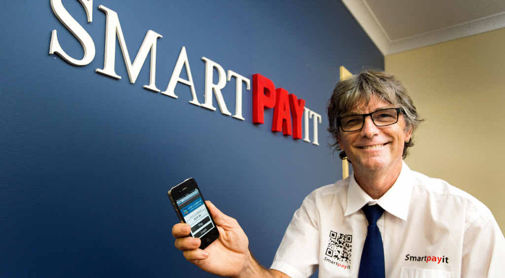 WAY TO PAY: Smartpayit CEO Keith Anderson at the launch of Coffs Harbour’s newest technology this week. WAY TO PAY: Smartpayit CEO Keith Anderson at the launch of Coffs Harbour’s newest technology this week.