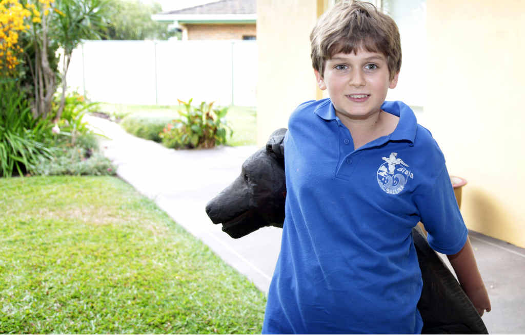 BEST FRIEND: William Nichols, 11, from Biala School in Ballina needs a specially trained dog for Autistic children.