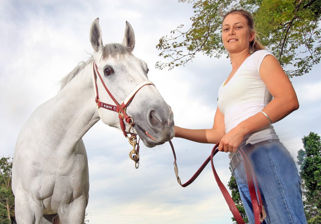 Track rider Kylie Coelli with The White Hope at Dunn stables near Murwillumbah. Track rider Kylie Coelli with The White Hope at Dunn stables near Murwillumbah.
