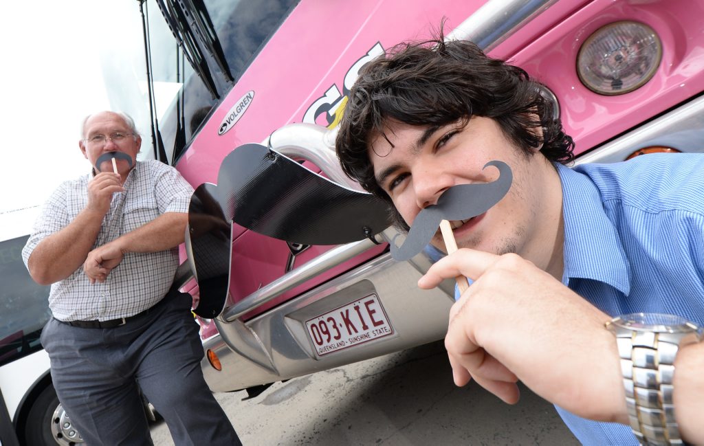 L-R Philip Young and Nic Griffin with one of the Youngs Buses which will sport a moustache for Movember. Photo: Chris Ison / The Morning Bulletin L-R Philip Young and Nic Griffin with one of the Youngs Buses which will sport a moustache for Movember. Photo: Chris Ison / The Morning Bulletin