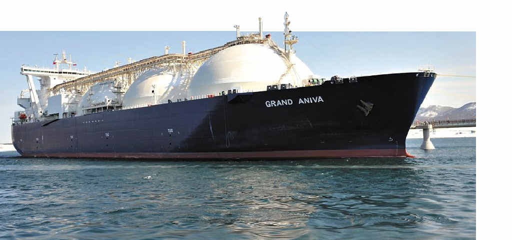 An LNG tanker pulls into port. An LNG tanker pulls into port.