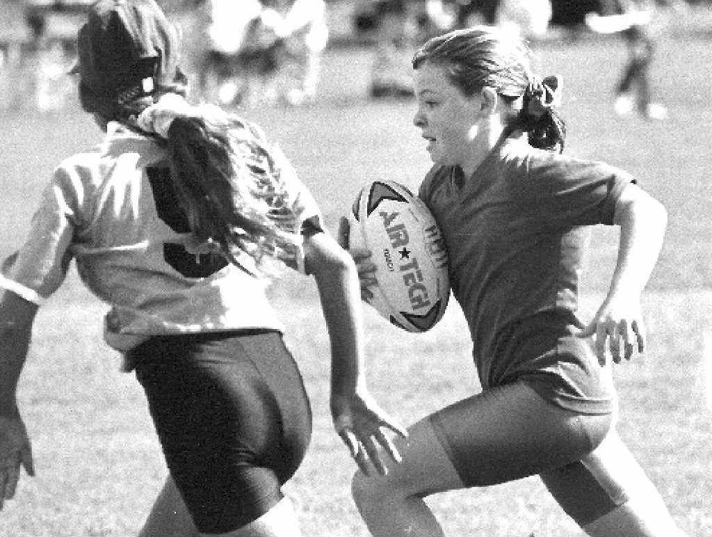 TOUCH OF CLASS: This photo, taken by Chronicle chief photographer Alistair Brightman, is of Hervey Bay’s Rachel Hinks trying to get around Maryborough’s Jackie Stevens in a touch football game in May 1996. TOUCH OF CLASS: This photo, taken by Chronicle chief photographer Alistair Brightman, is of Hervey Bay’s Rachel Hinks trying to get around Maryborough’s Jackie Stevens in a touch football game in May 1996.