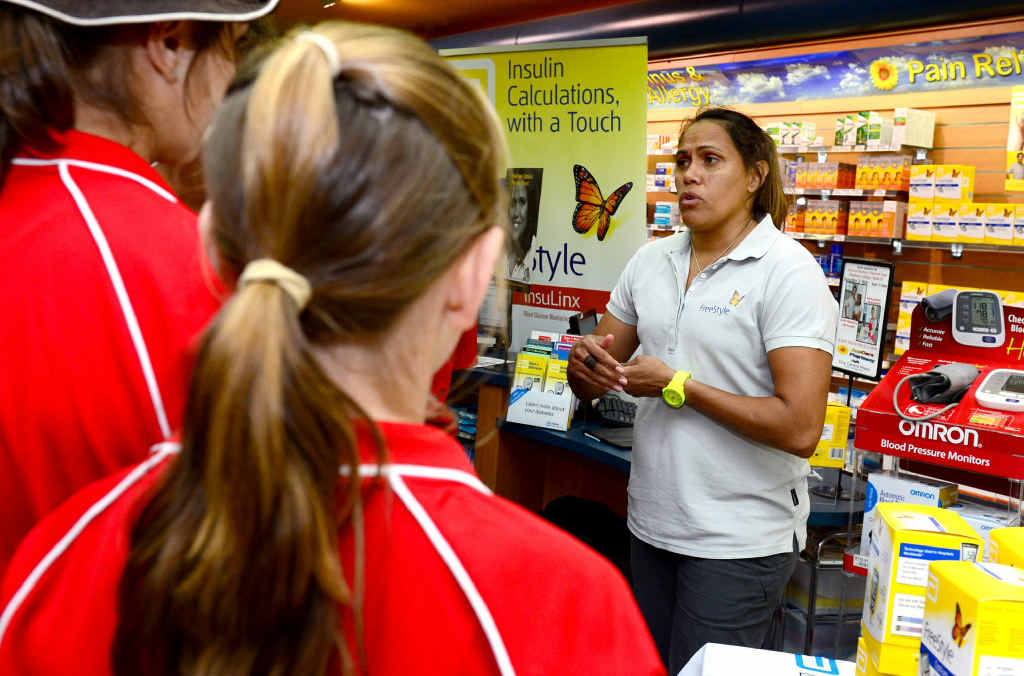 AFFLICTED CHAMP: Cathy Freeman tells some young fans about Diabetes at Auscare Pharmacy, City Centre Plaza, following the Diabetes Expo. AFFLICTED CHAMP: Cathy Freeman tells some young fans about Diabetes at Auscare Pharmacy, City Centre Plaza, following the Diabetes Expo.