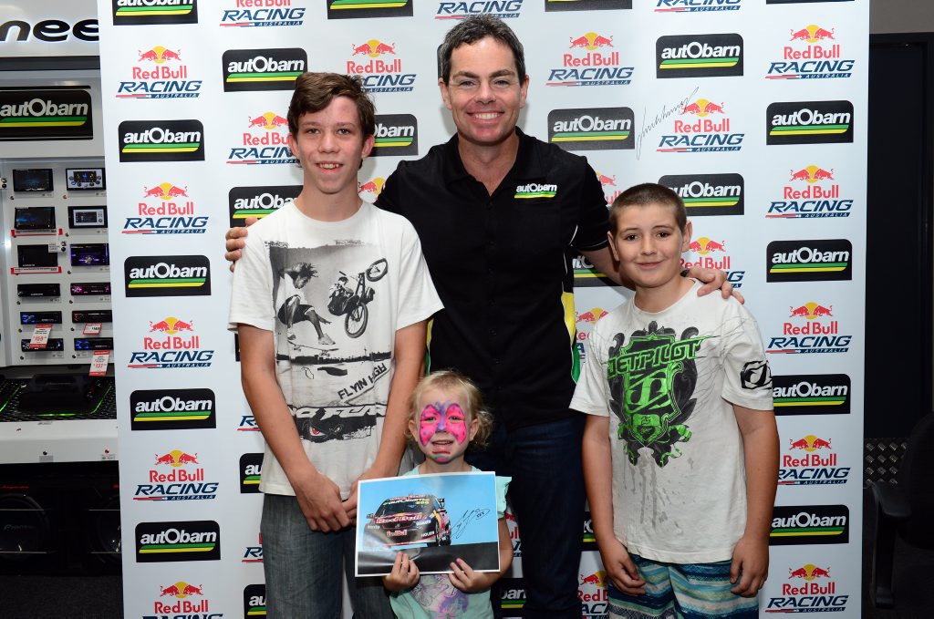 V8 Supercars driver Craig Lowndes with young fans, Jye Brady, 14, Paige Brady, 5 and Mitch Simmons, 11. Photo Sharyn O'Neill / The Morning Bulletin V8 Supercars driver Craig Lowndes with young fans, Jye Brady, 14, Paige Brady, 5 and Mitch Simmons, 11. Photo Sharyn O'Neill / The Morning Bulletin