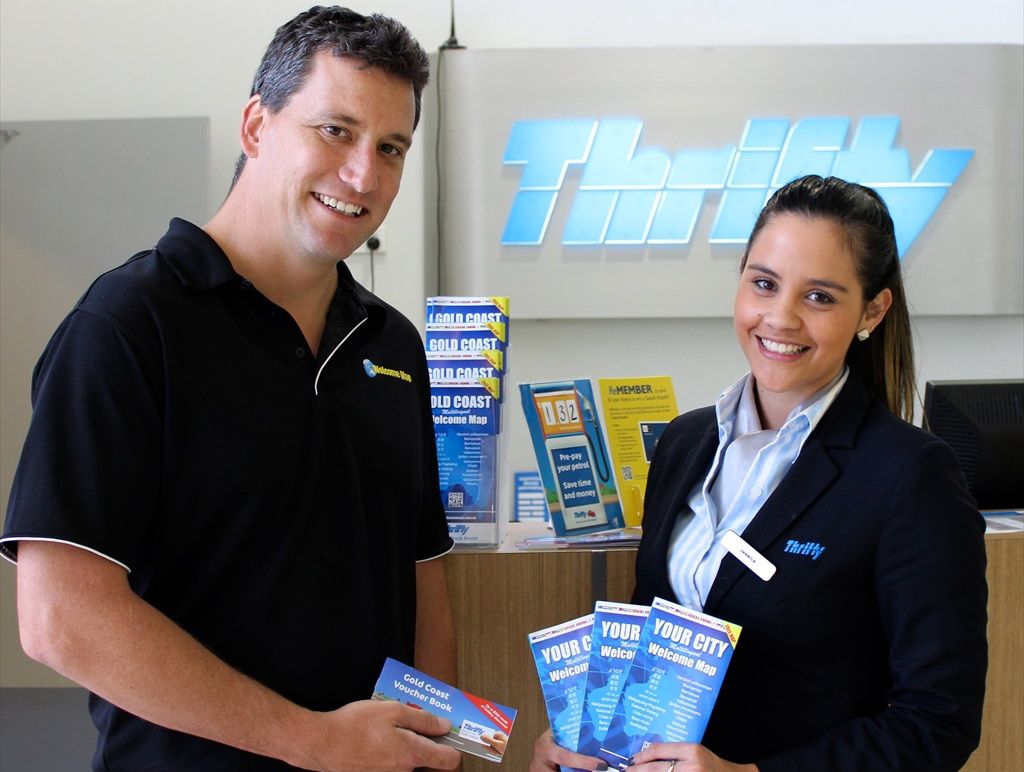 Matthew Simons and Thrifty employee Jessica Betts with the tourist welcome maps and voucher books on offer to people who rent cars. Matthew Simons and Thrifty employee Jessica Betts with the tourist welcome maps and voucher books on offer to people who rent cars.