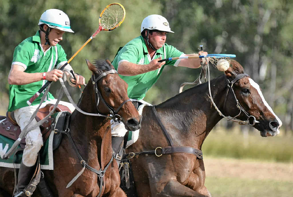 FOCUSED: State player Matt Shepherd (right) in action for Warwick in the A-grade polocrosse final at the Cunningham carnival.