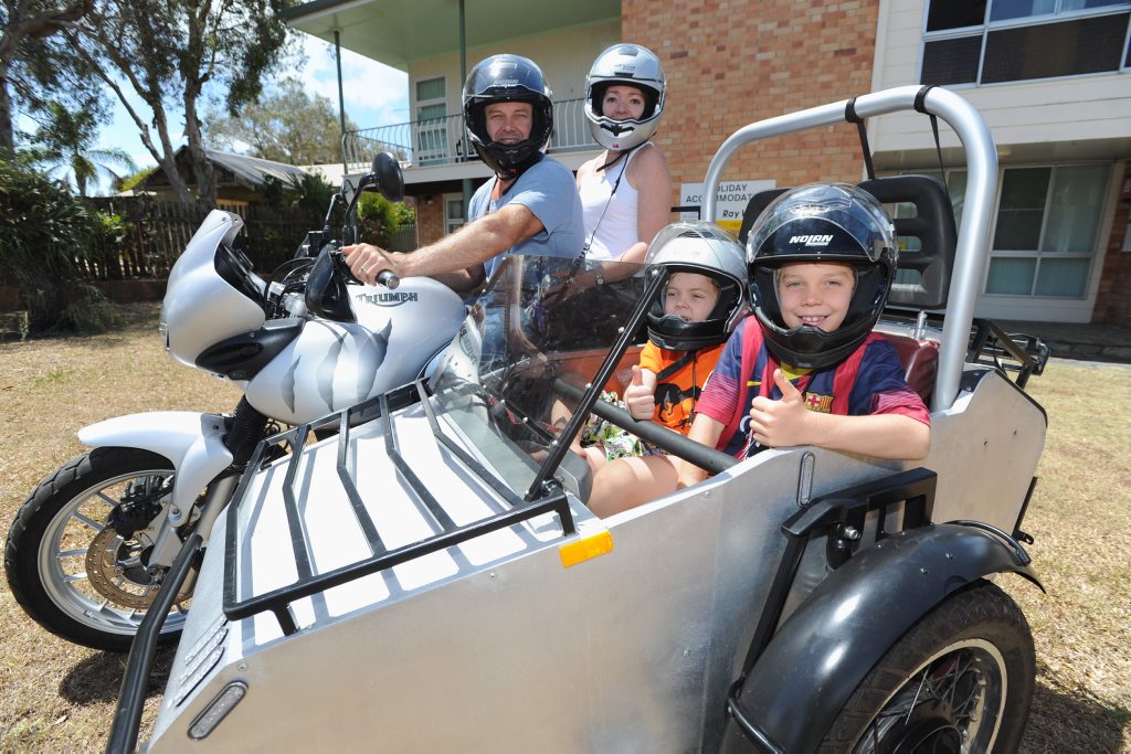 Mal Topfer, wife Anya and children Kian,7, and Jai,9, from Tannum Sands. Travelling around in the sidecar he built to go with his Triumph 955 Tiger. It took Mal a year to build and they took it on its maiden voyage some 2,000km around outback Queensland. This time it was just a quick trip to Hervey Bay but they'd love to go out to Uluru. Mal Topfer, wife Anya and children Kian,7, and Jai,9, from Tannum Sands. Travelling around in the sidecar he built to go with his Triumph 955 Tiger. It took Mal a year to build and they took it on its maiden voyage some 2,000km around outback Queensland. This time it was just a quick trip to Hervey Bay but they'd love to go out to Uluru.