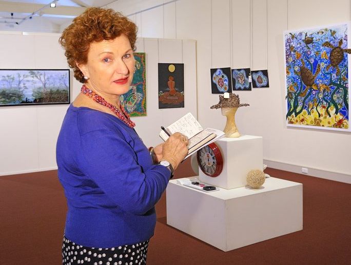 Julie Ewington inspects the entries of the 2013 Rio Tinto Alcan Martin Hanson Memorial Art Awards Photo Mike Richards / The Observer Julie Ewington inspects the entries of the 2013 Rio Tinto Alcan Martin Hanson Memorial Art Awards Photo Mike Richards / The Observer