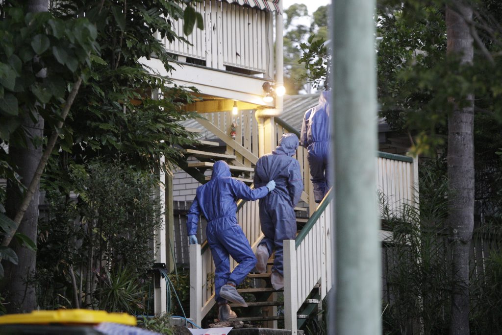 A man is led around by police at a house on Horseshoe Bend at Buderim after a lady was found in a burnt out car off Sippy Creek Road. A man is led around by police at a house on Horseshoe Bend at Buderim after a lady was found in a burnt out car off Sippy Creek Road.