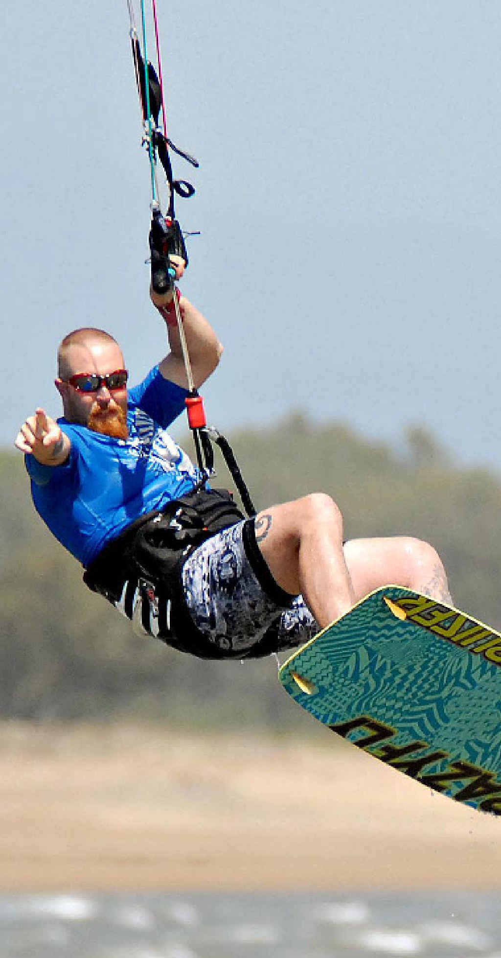 Shane Martin, kite surfing off Town Beach, has been caught up in one of the biggest typhoons to hit the Philippines. Shane Martin, kite surfing off Town Beach, has been caught up in one of the biggest typhoons to hit the Philippines.