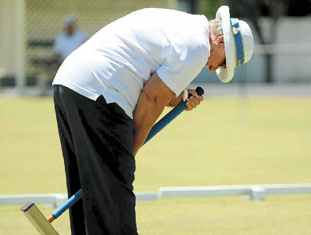 LINING UP: Pam Baker in her first association croquet tournament at the Sunnyside Croquet Club.